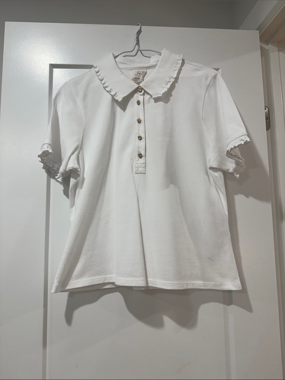 White Ruffled Collar Polo Top - woman’s. Cinq a Sept size L but fits like a Med